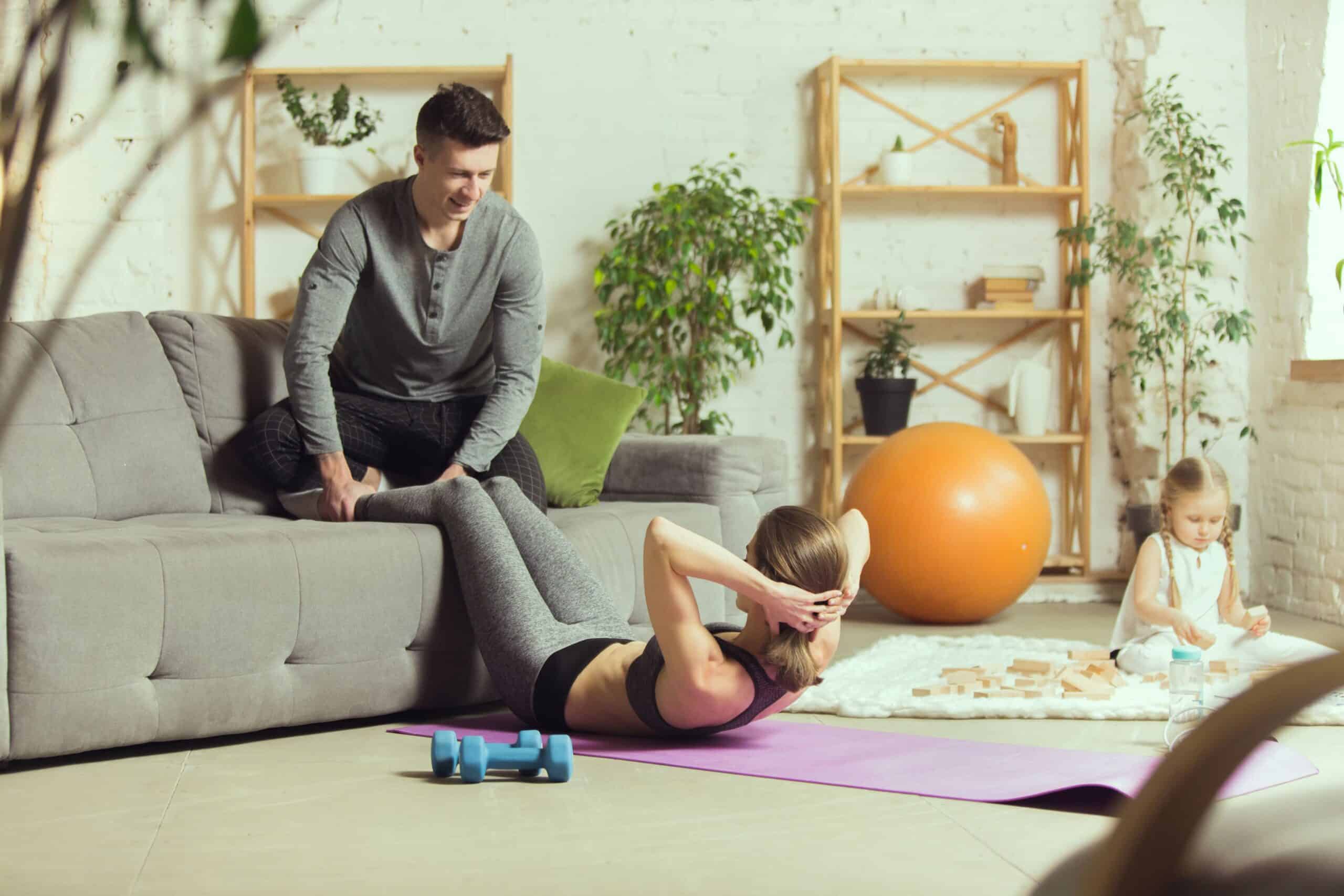 young-woman-exercising-fitness-aerobic-yoga-at-home-sporty-lifestyle-getting-active-during-lockdown-quarantine-home-gym.jpg1